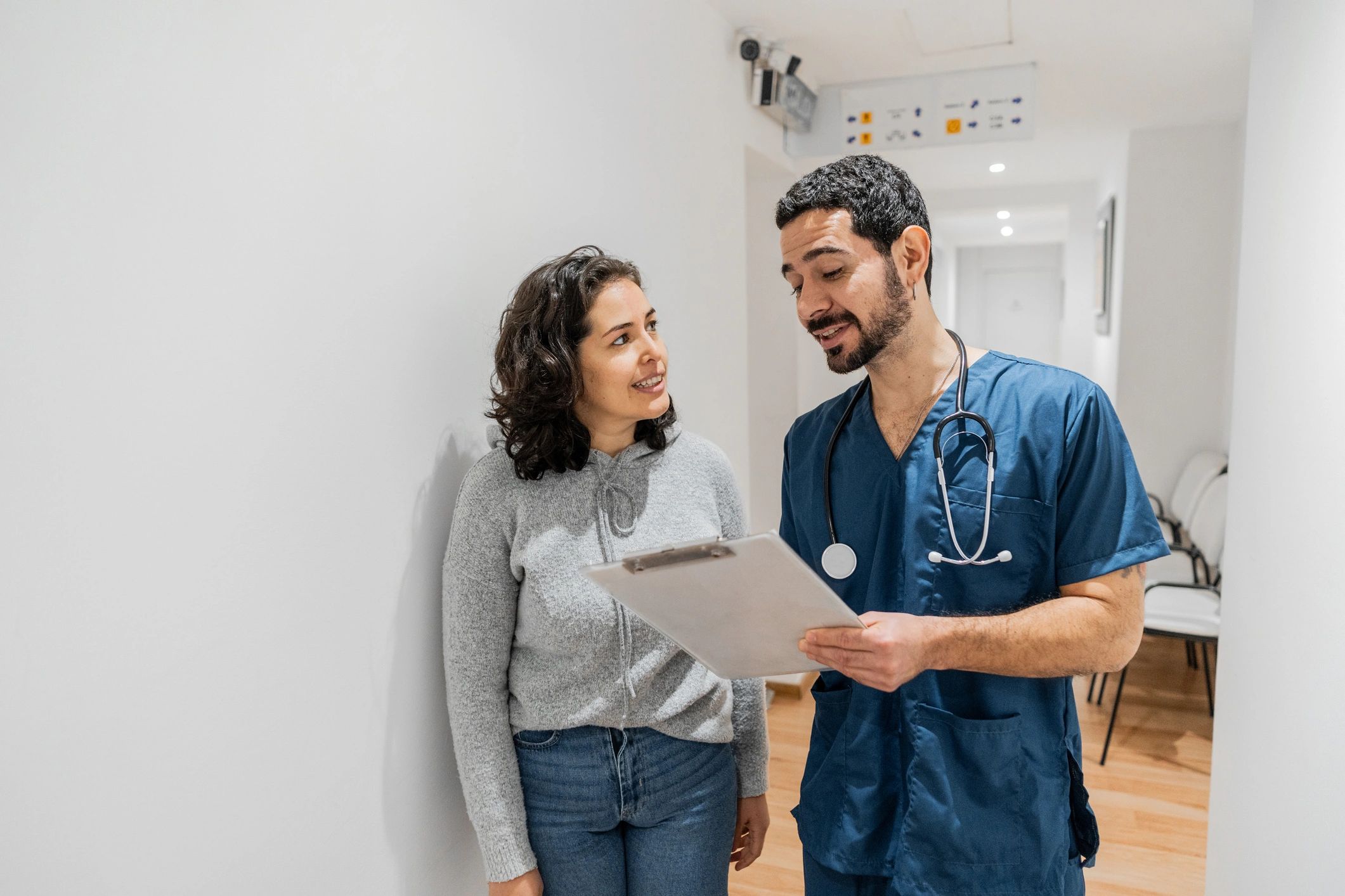 Clinician consulting with a patient about travel health