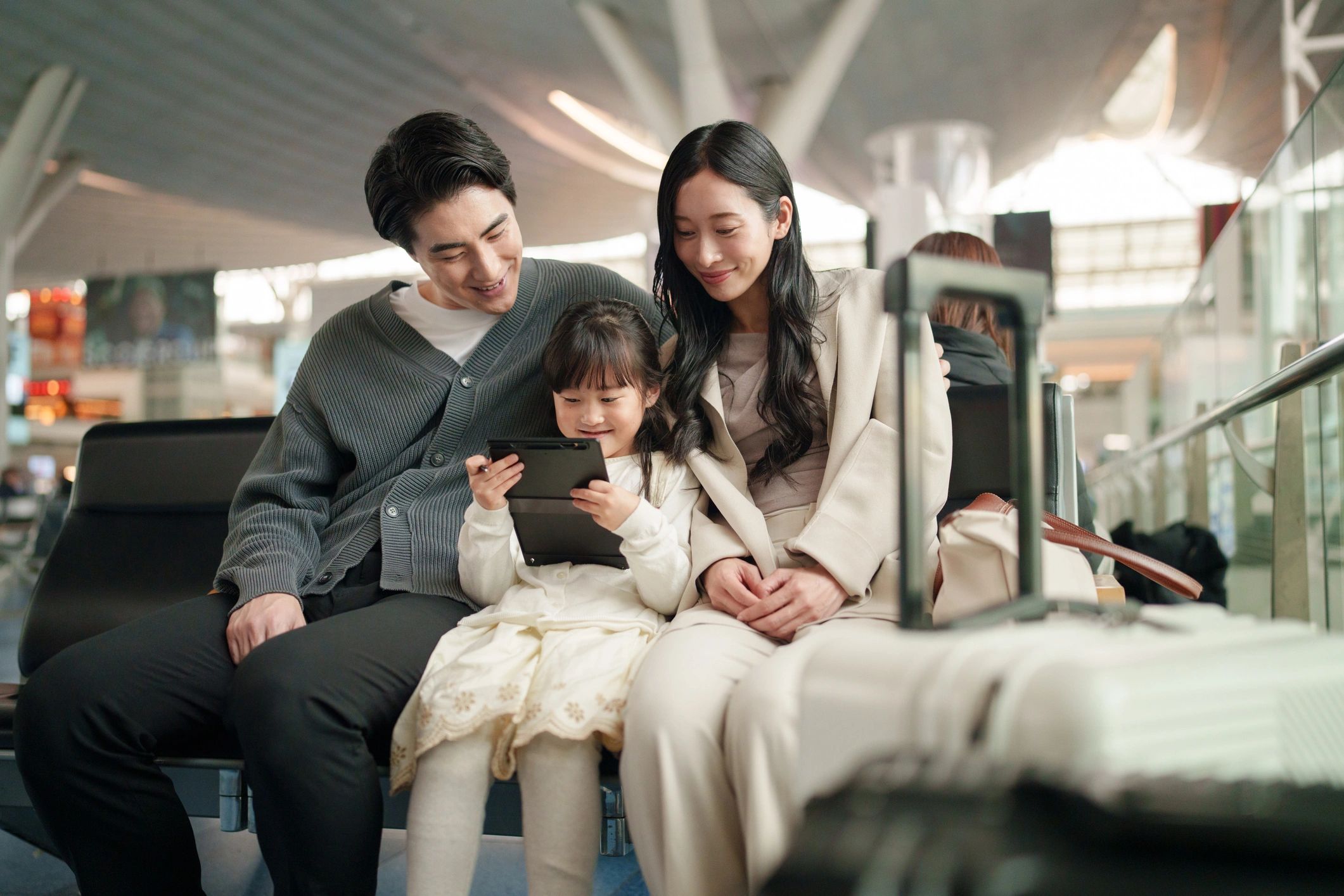 Family travelers waiting at an airport